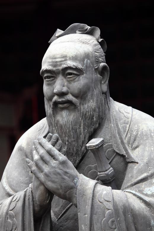 A statue of Confucius, the founder of Confucianism, which arose during the Zhou Dynasty.