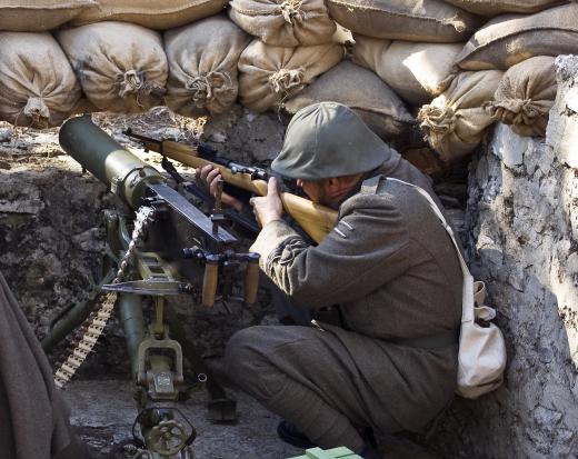 Soldiers in trenches were often the target of human wave attacks in war.